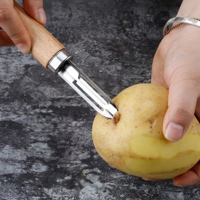 econome avec manche en bois Ćil pomme de terre