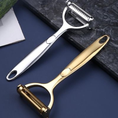epluche legume inox gold design et minimaliste