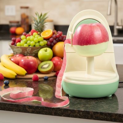epluche pomme compact antidérapante dans une cuisine avec des fruits