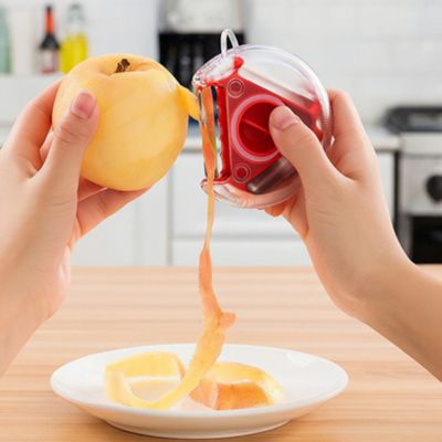 epluche tomate épluchage d'une pomme avec peau fine