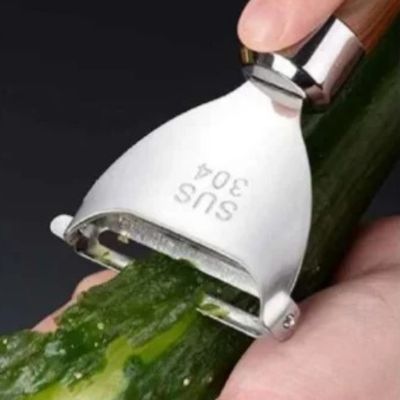 éplucheur à légumes avec prise ergonomique pour concombre