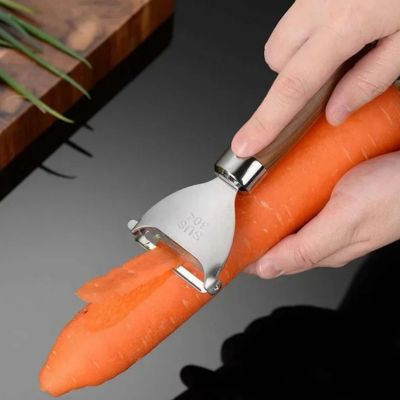 éplucheur à légumes en inox pratique pour carottes