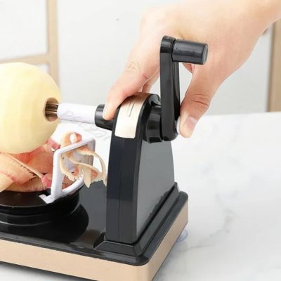 éplucheur à pomme sûr qui protège les doigts