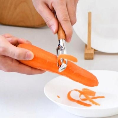 économe à tomates polyvalent durable bois légumes carottes