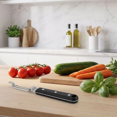 économe à tomates design lame pivotante cuisine legumes