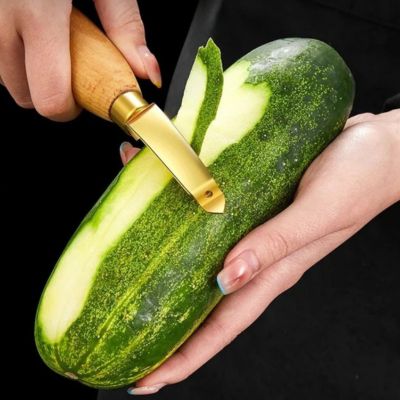 économe à tomates polyvalente inox design concombre