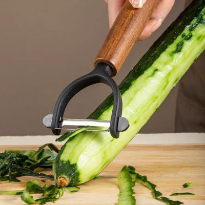 eplucheur tomate précis manche en bois concombre
