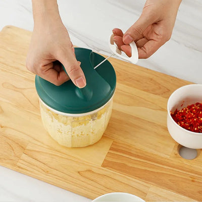 hachoir à legume manuel compact léger efficace rapide