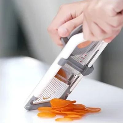 mandoline japonaise découpe carottes râpées