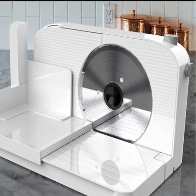 mini trancheuse charcuterie blanche précise cuisine moderne