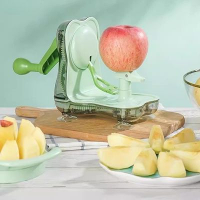 pèle pommes vert design cuisine avec coupe pomme morceaux
